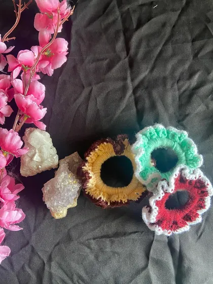 Another group shot of the crochet hair ties. I use a durable elastic inside so they have a good stretch but also hold your hair securely. You can order a single scrunchie or a custom set.
