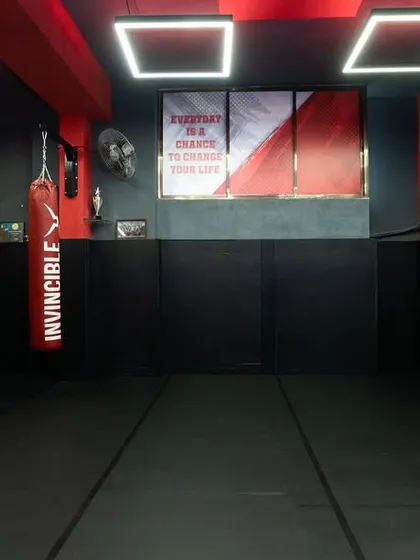 Our training space from a different angle, highlighting the clean, professional environment we maintain for our fighters.