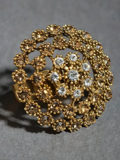 A delicate, filigree-style adjustable ring with sparkling stones.