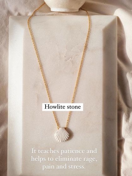 Another view of the Howlite Shell Pendant. Its purpose is to teach patience and help manage stress and anger, making it a powerful healing tool.