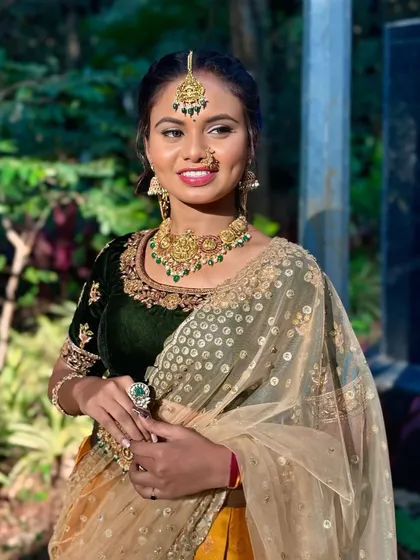 A beautiful bride-to-be in a green and gold lehenga, complemented by my antique choker set with green stones. This is a great option for an engagement or mehendi ceremony.
