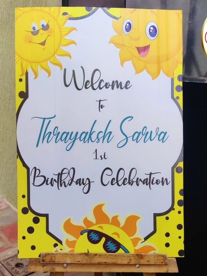 A personalized welcome sign for a "First Trip Around the Sun" themed birthday.