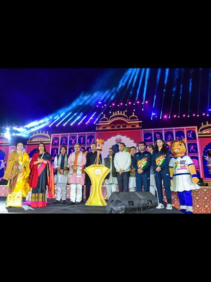 Dignitaries and athletes on stage during the Khelo India University Games opening ceremony. Our stage and artist management ensured all participants were guided smoothly through the proceedings.