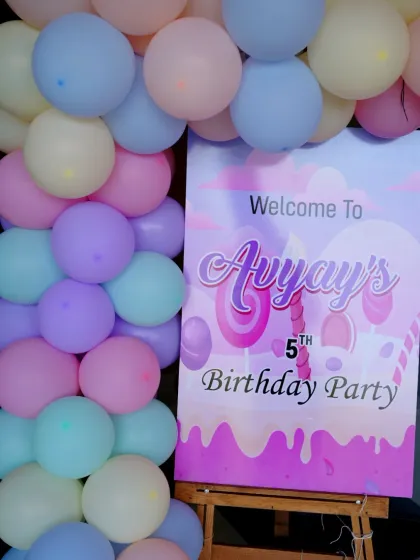 A personalized welcome sign for Avyay's 5th birthday party. The pastel candy theme is introduced right from the entrance, setting a sweet tone for the celebration.