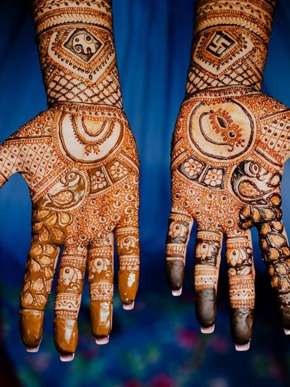 A close-up of the palms from the previous design, showing the detail in the elephant and paisley motifs.