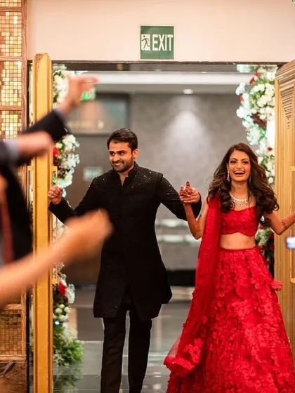 The happy couple making their sangeet entry through a tunnel of their cheering friends and family. We help coordinate these moments to kick off the night with high energy.
