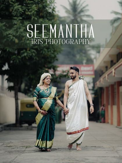 A candid shot of the couple walking together during their Seemantha ceremony. It shows their partnership and joy as they step towards parenthood.