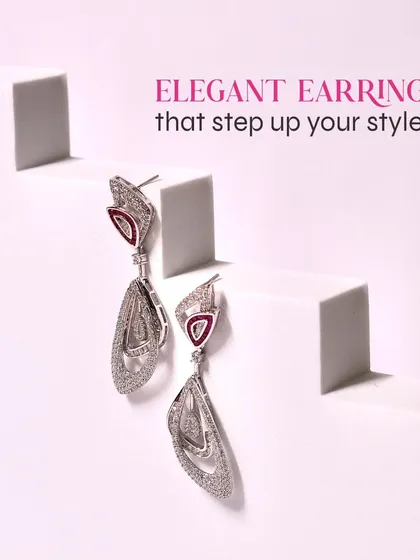 Elegant earrings that step up your style. These geometric, sparkling dangles are a perfect example of modern sophistication.