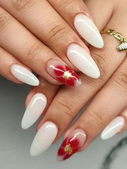 Another view of these elegant milky white nails with a beautiful red floral accent.