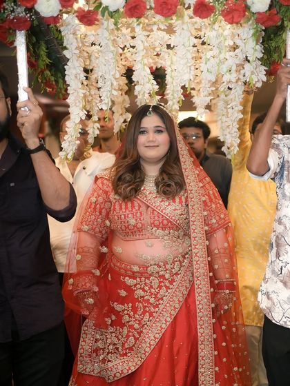 The bride's entrance, looking confident and radiant. I ensure every bride feels like a queen on her wedding day.