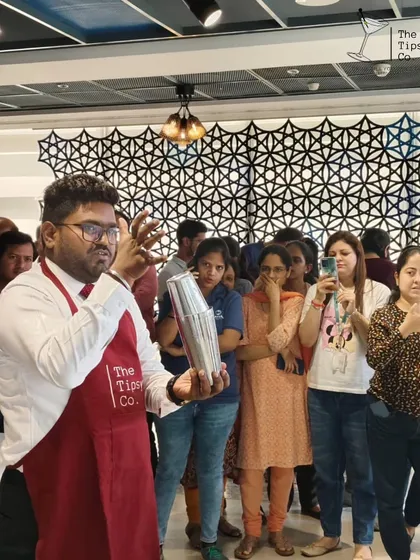 Our instructor demonstrates a flair move to an amazed audience during a workshop. We mix education with entertainment to keep our sessions engaging.