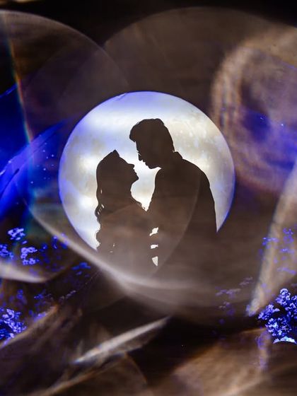 Another creative take on the moon silhouette, this time using a prism to create a beautiful, distorted light effect. This is how we play with our tools to make your photos unique.