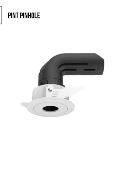The Pint Pinhole downlight is designed for discreet, powerful lighting. Its small aperture provides a focused beam of light, making it ideal for accenting details without cluttering the ceiling.