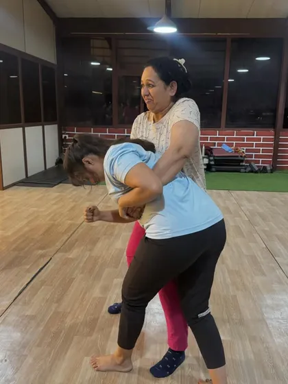 Here, we are practicing a fundamental escape from a rear body hold. Our workshops focus on simple, effective techniques that you can use under pressure, ensuring you have the muscle memory to protect yourself when it counts.