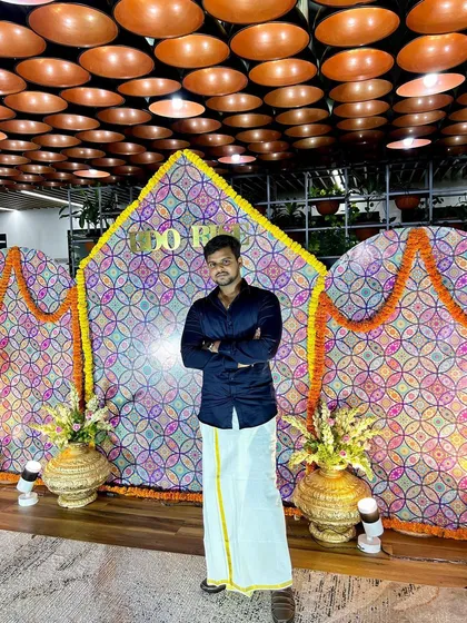 Posing at the decorated photo booth during our office Diwali event. I believe in celebrating successes, both in the office and for my clients' financial milestones.