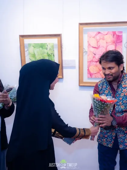 Receiving a token of appreciation at an exhibition. Being part of these events helps me bring real-world experience back to my students.