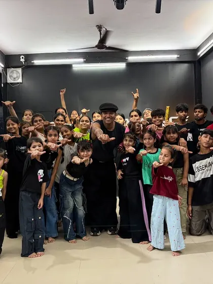 The whole squad pointing at the man of the hour, Rinku, during our 100k celebration.