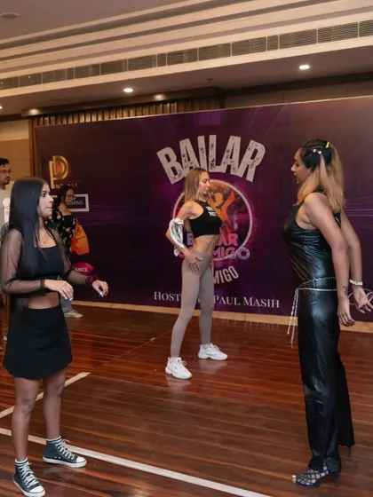 A moment of instruction at the Bailar Conmigo festival. I believe in a hands-on approach, working closely with students to refine their technique.
