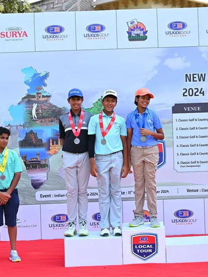 Rayirth on the podium with fellow competitors at the USKids New Delhi Fall 2024 tour.