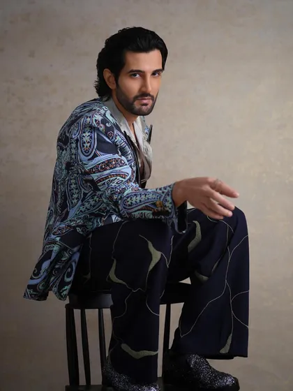 For Aditya Seal's FHM India cover story, I designed this look to feel both relaxed and luxurious. The printed tuxedo jacket is paired with a silk shirt and patterned trousers, creating a cohesive statement that is effortlessly cool.