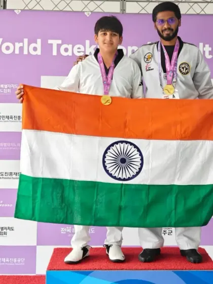 A proud moment for Team CTA and India. Standing on the podium with my student at the 18th World Taekwondo Culture Expo, holding our national flag high.