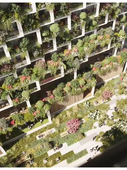 An aerial view of the cascading green terraces and balconies of Sky Gardens, which form a continuous vertical park.