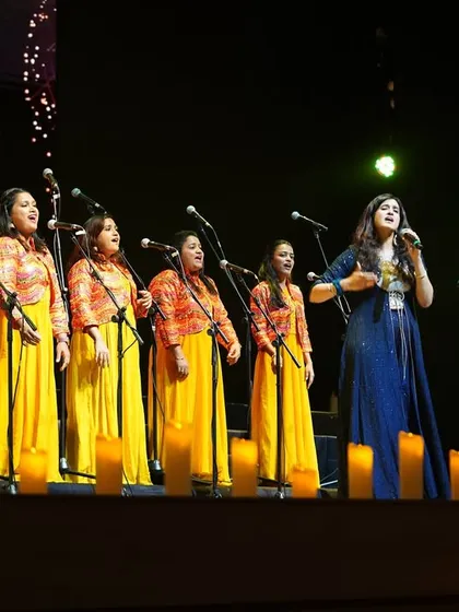 Our students performing at a special ceremony at Shrimad Rajchandra Mission Dharampur. We train our students for various prestigious events, giving them invaluable performance experience.
