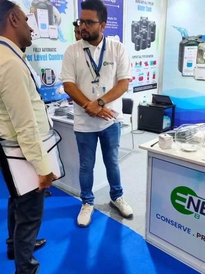 An attentive visitor listens as our team member explains the workings of the FloSenso smart water level controller. We believe in educating our customers on how they can conserve water effectively.