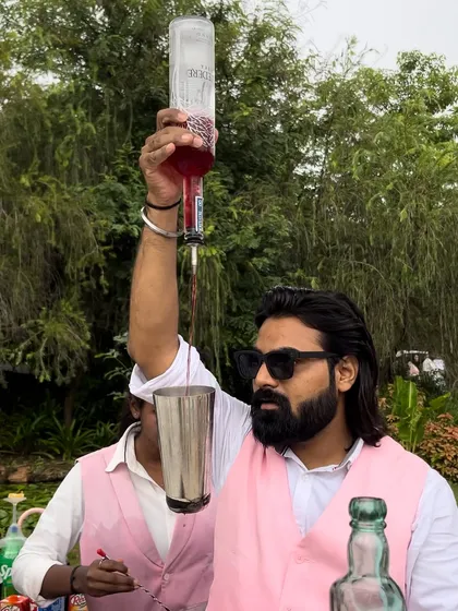 A steady hand and a bit of flair make all the difference. I take pride in the craft of mixology, ensuring every drink is made with skill and showmanship.