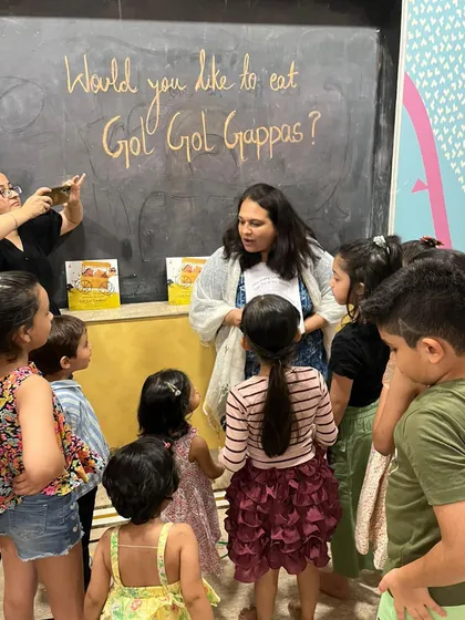 The children are completely captivated during our "Gol Gappa" story session. We encourage them to gather close, ask questions, and be a part of the narrative.