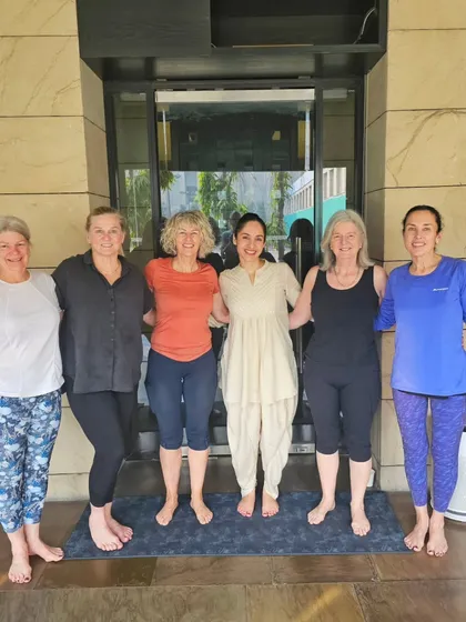 With a wonderful group of yogis from around the world. It's amazing how yoga unites us, creating instant connections and a shared sense of purpose and joy.