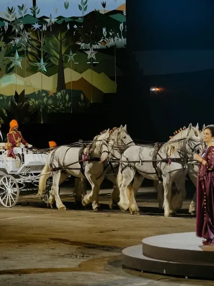 A magical moment from the Ambani pre-wedding festivities in Jamnagar, featured in Vogue. The grand entrance with a horse-drawn carriage felt like a scene from a fairytale, showcasing the imaginative and grand scale of the event.