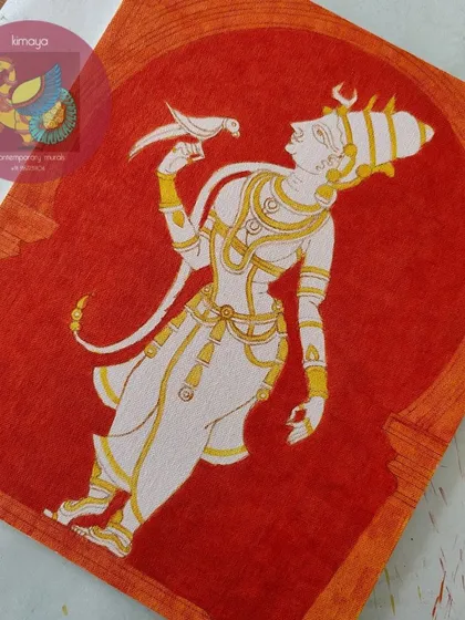 The Meenakshi painting with the first layers of color on a red background, before the green is applied.