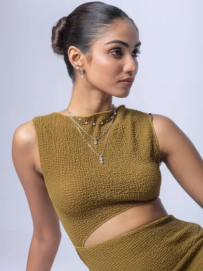 Another perspective on layering. This shot helps customers visualize how the different lengths of the Nipura Fashion necklaces fall.