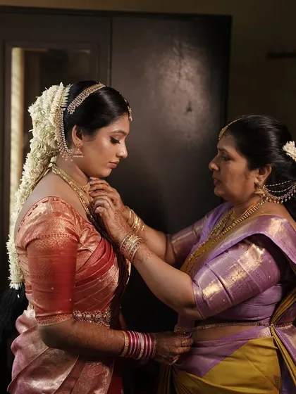 A touching moment between a bride and her mother. It's these precious memories that make my job so special, and I ensure my makeup is tear-proof for these emotional moments.