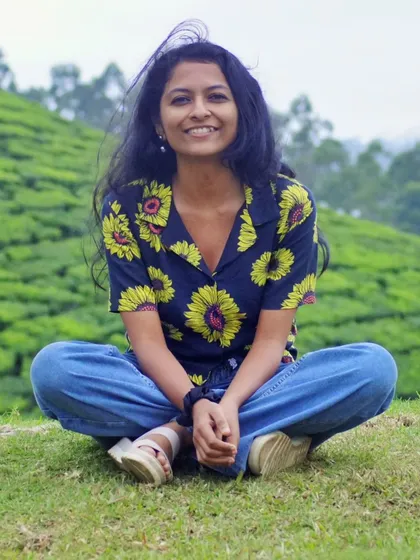A moment of pure joy amidst the tea gardens of Munnar. My practice is rooted in finding this kind of simple happiness and connection, embracing the world around us with an open heart.