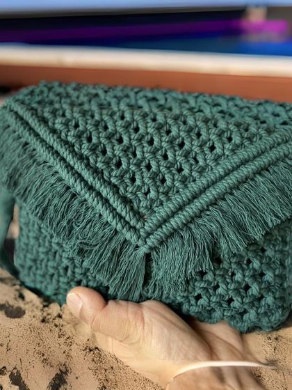 For those who love earthy tones, this green sling bag is a wonderful choice. The deep green color is beautiful, and the fringe adds a lovely bit of texture.