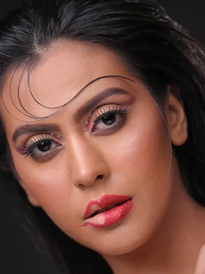 A direct, confrontational pose that embodies the theme. The two-toned lip and graphic hair are key details.