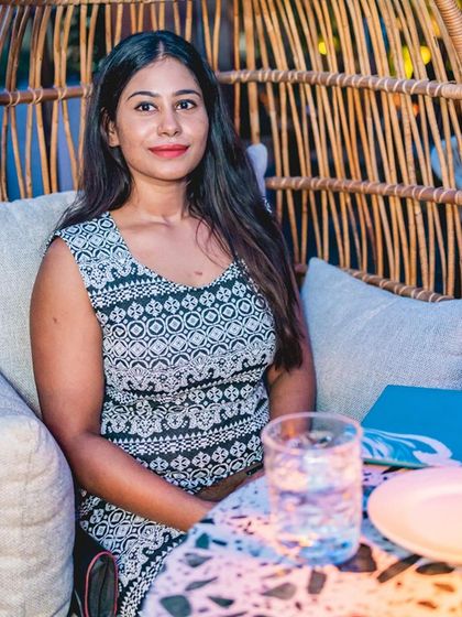 A guest relaxing in a wicker chair at TYD.