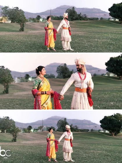 A series of wide shots showing the couple walking hand-in-hand through a scenic landscape, capturing the grandeur of their royal Marathi wedding look.