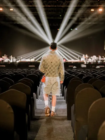 Walking into an empty venue for a 3am soundcheck. There's a unique magic in the quiet before the storm, a moment to connect with the space before it's filled with people and music.