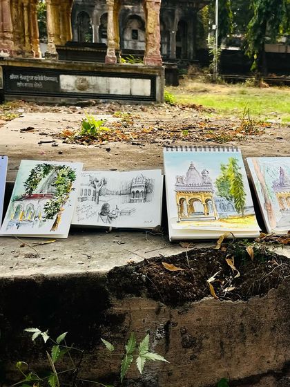 A lineup of sketchbooks from our urban sketching session in Nagpur. It's amazing to see how different artists interpret the same scene.