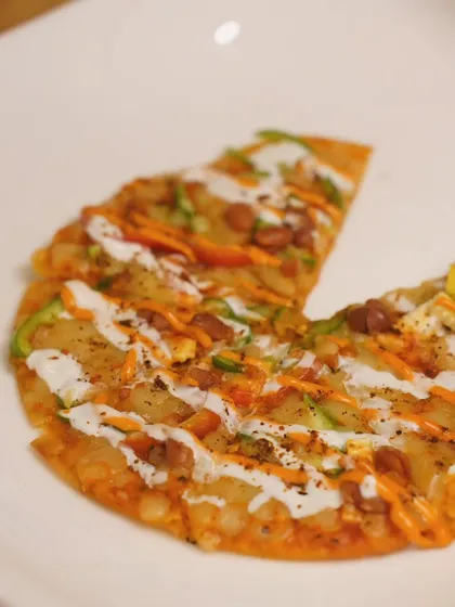 A slice of heaven. This is my Chipotle Mexican Pizza, a crispy tortilla base topped with beans, cheese, and a smoky chipotle sauce.