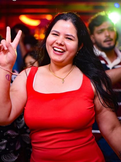 A joyful moment captured on the dance floor. This is what a great night out is all about.