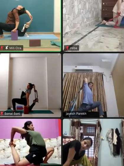 My online students use props like blocks and straps to assist them in deep stretches, just as we would in the studio.