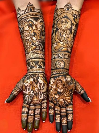 A design rich with storytelling and religious figures. The palms show the wedding rituals, while the arms feature depictions of Radha Krishna and other deities.