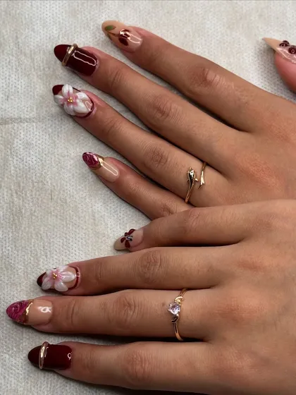 Another perspective on this stunning, multi-technique nail set, created by our talented students.