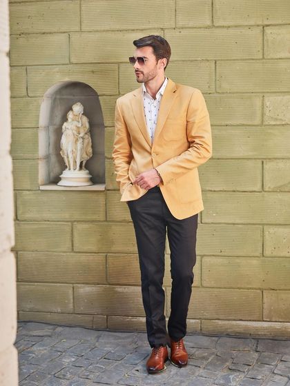 A classic pose in the Buttercup Yellow linen jacket. This piece is part of my Sartorial Summer Edit, designed for the modern man.