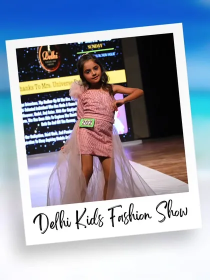 This model looks chic and stylish in a pink dress with a sheer train. Her pose shows the confidence and runway presence that participants develop.