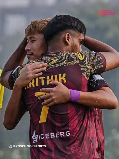 A moment of camaraderie and friendship between two players after a goal. This is what teamwork looks like.
